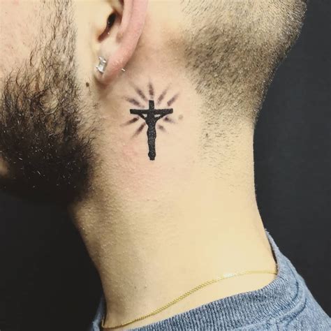 cross tattoo on neck for guys